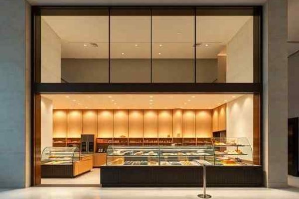 {"prompt":"professional architectural photography of a luxury bakery and emporium interior in Brazil, minimalist modern design, high-end finishes, warm cinematic lighting, large glass facade displaying gourmet products, photorealistic sharp focus, sophisticated architectural details","originalPrompt":"professional architectural photography of a luxury bakery and emporium interior in Brazil, minimalist modern design, high-end finishes, warm cinematic lighting, large glass facade displaying gourmet products, photorealistic sharp focus, sophisticated architectural details","width":512,"height":512,"seed":42,"model":"flux","safe":false,"quality":"medium","image":[],"transparent":false,"reasoning":"balanced","audio":true,"dimensionsExplicit":true,"isMature":false,"isChild":false,"trackingData":{"actualModel":"flux","usage":{"completionImageTokens":1,"totalTokenCount":1}}}